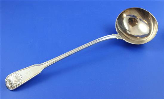 A Victorian silver fiddle, thread and shell pattern soup ladle, 9.5 oz.